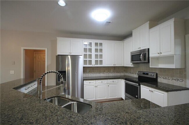 Building Photo - 1806 Babbling Brook NW