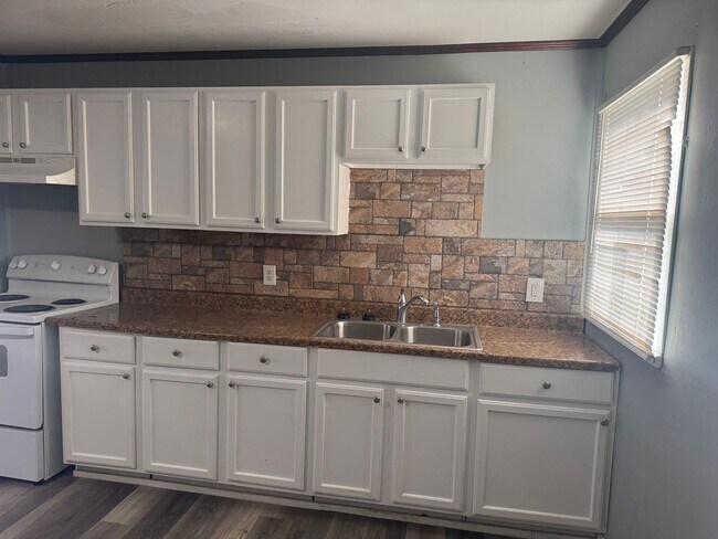 Foto del edificio - 4715 E 33rd St