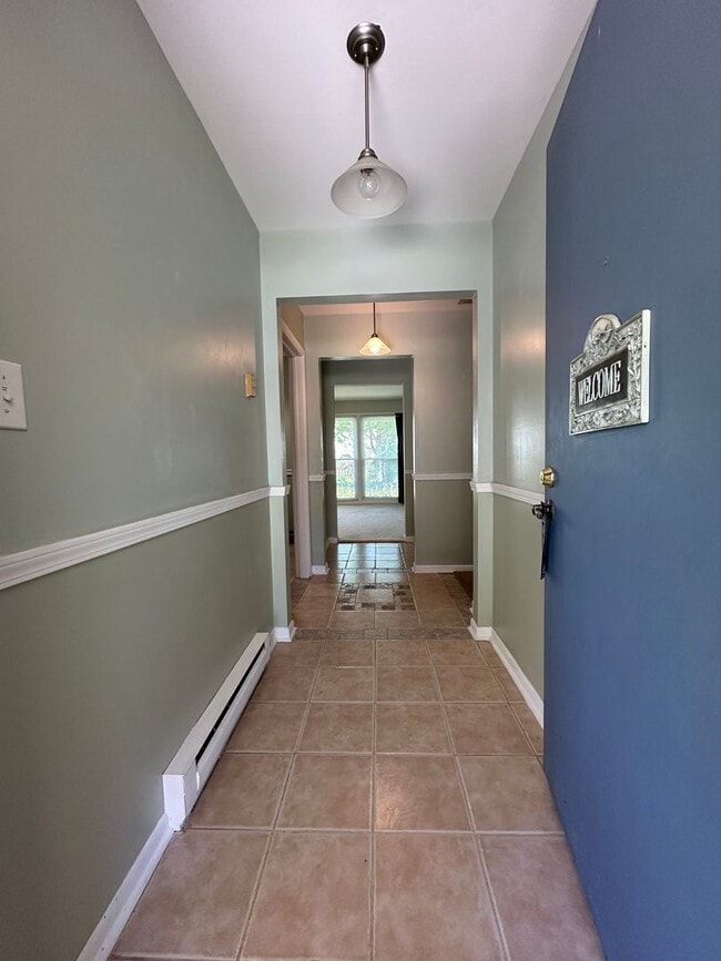 Building Photo - Not Your Typical Rental — Warm, Welcoming 3BR Brick Ranch in a Prime Neighborhood