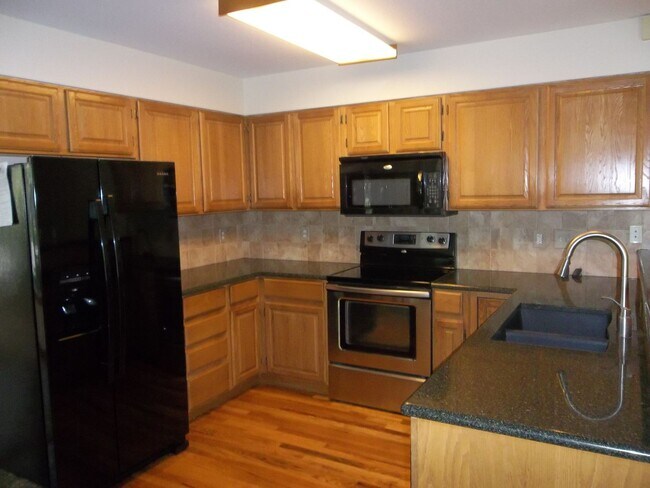 Building Photo - Comfort & Space in Fort Collins – 5BR Home...