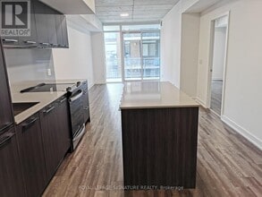 Building Photo - 665-665 Queen St E