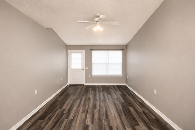 Building Photo - 2BR Patio Home with LVP Flooring, Private Fenced Yard, & Convenient Blue Angel Pkwy Location Near...