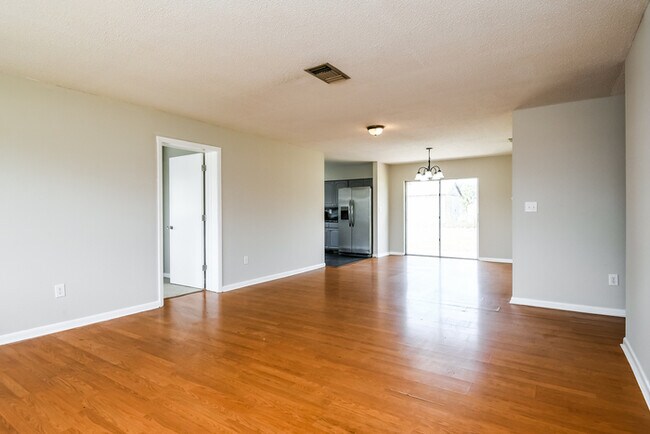 Building Photo - Inviting 4-Bedroom Home with Large Yard