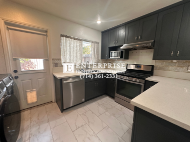 Building Photo - Charming 2-Bedroom Condo with Private Pati...