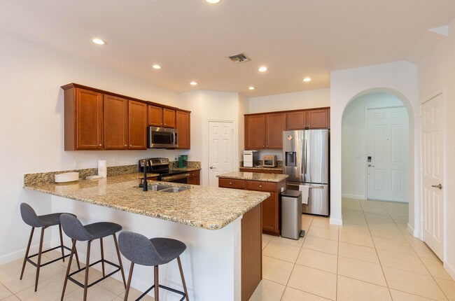 Foto del edificio - 10349 Wellington Parc Dr