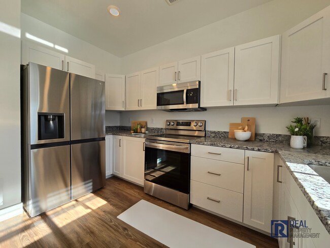 Building Photo - New & Modern 2-Story Townhome for Rent in ...