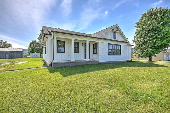 Building Photo - Updated and restored Original Farm House Style