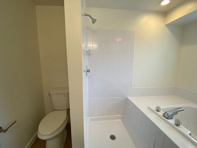 Building Photo - Stylishly Renovated Home with Private Back...
