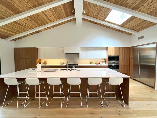 Building Photo - Sleek, Stylish & Surrounded by Green – The...