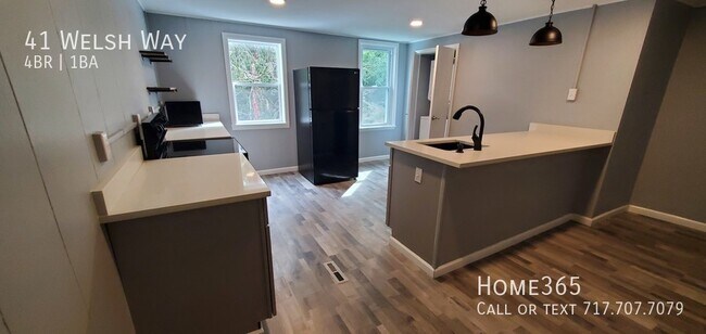 Building Photo - MOVE IN SPECIAL -NEWLY RENOVATED 4 BEDROOM...