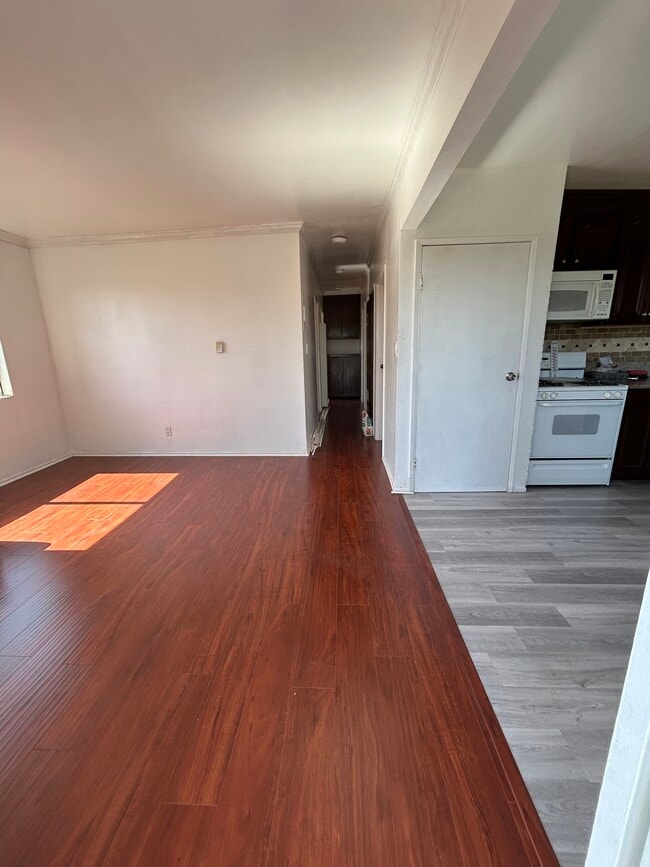 Living room space snd kitchen - 1156 N Chicago St