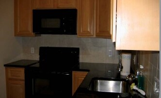 Apartamentos contemporáneos de la cocina - 255 N Queen St