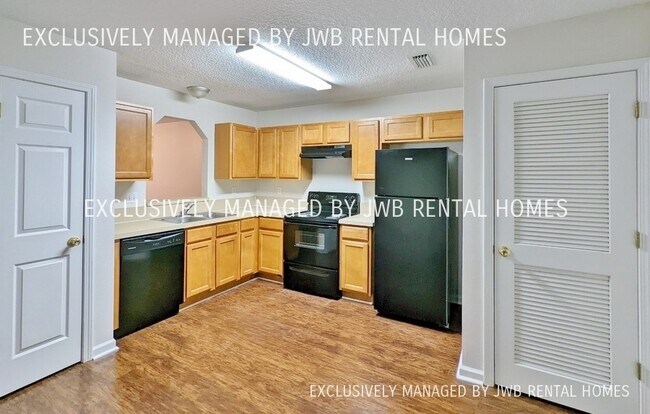 Building Photo - 8446 McGirts Village Ln