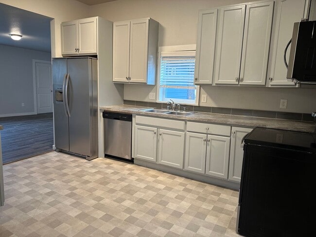 Building Photo - Fully Remodeled Home with Bonus Suite – A ...