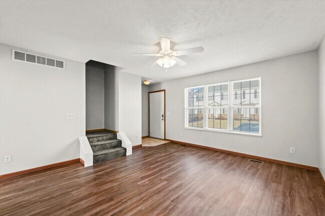 Foto del edificio - Well-Appointed 3-Bedroom, 3-Bathroom Townhome With Finished Basement and Patio