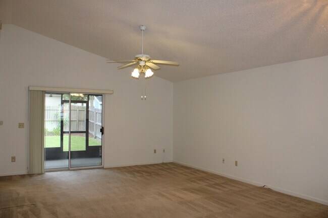 Building Photo - 11202 Mikris Dr N