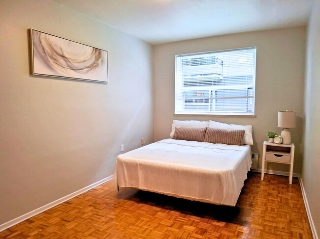 Bright Bedroom with Ample Closet Space - The Diplomat Apartments