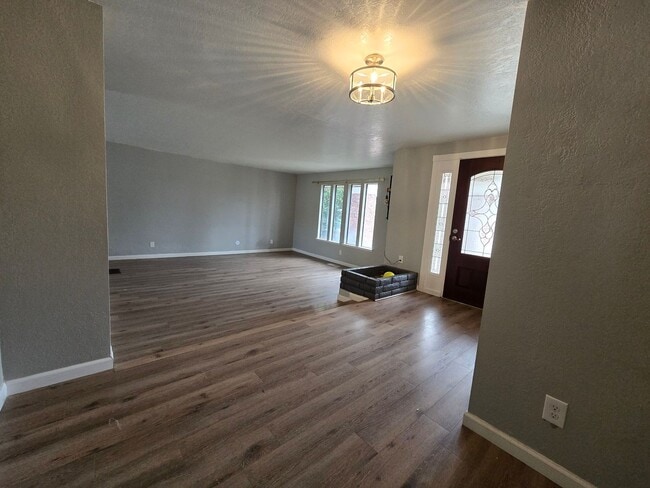 Building Photo - 4 BR 3 BA with pool and solar availble Now