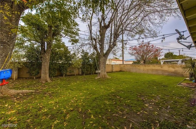 Foto del edificio - 4 br, 2 bath House - 817 N Langham Ave