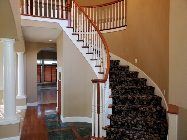 Entryway stair case - 1895 Satterfield Dr