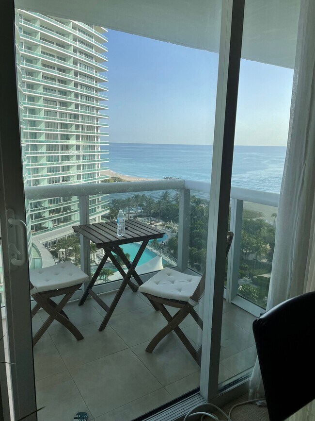 Building Photo - 10275 Collins Ave