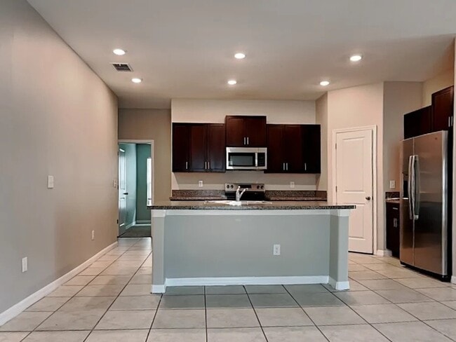Building Photo - 1615 Blue Rose Dr