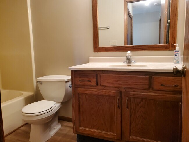 bathroom has a raised vanity - 1111 Country Club Ln