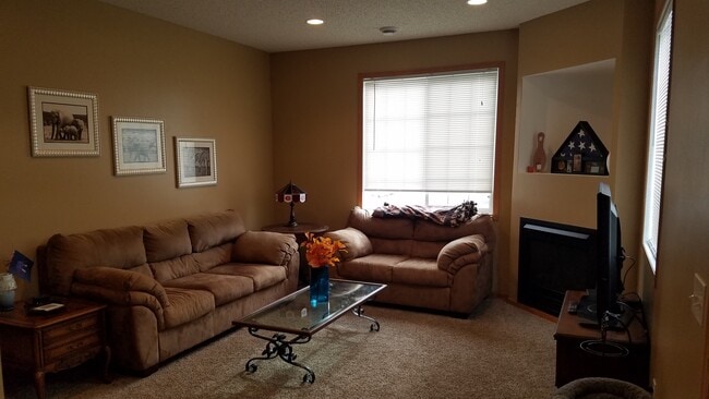 Living Room from Dining Room. Main Level, 9 foot ceiling. - 17195 Monroe Drive NW