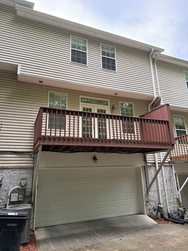Garage entry, deck entry from dining space , 2nd bedroom 3rd floor - 10724 Prince Albert Way Townhome
