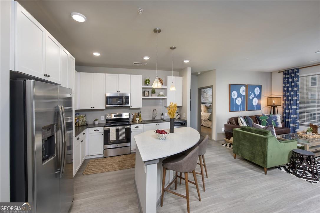 Foto principal - 6105 Peachtree Dunwoody Rd