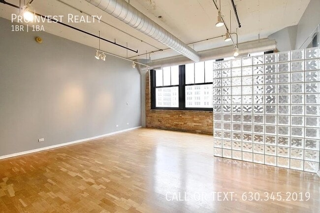 Building Photo - Available Now! Sprawling Sun-drenched 1Bed...