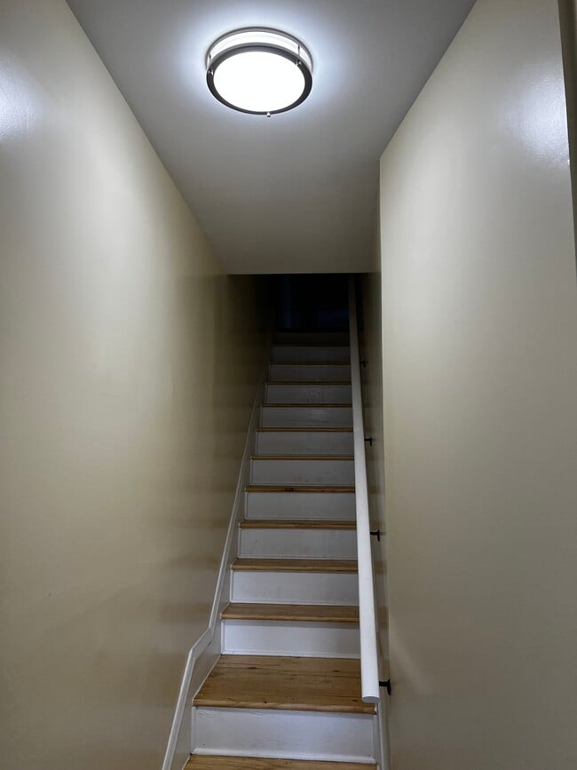 Stairway to from front entrance to Apartment - 2210 Jessup St