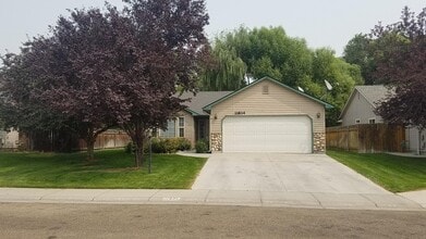 Building Photo - 11834 W Huckleberry Dr