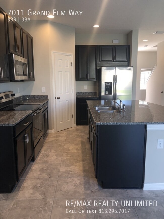 Building Photo - 7011 Grand Elm Dr