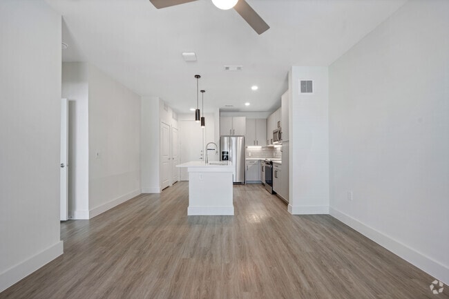 1BR, 1BR - 724SF - Living Room - Aura Main Street