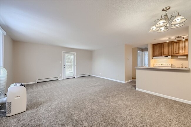 Photo - Top-floor, 2-bed 1-bath condo located near the highly desirable Old Town Arvada!