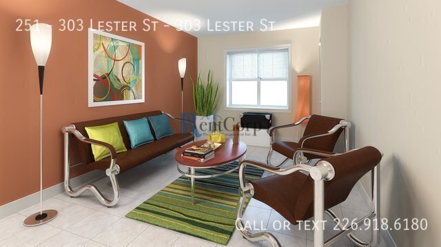 Photo du bâtiment - 303-303 Lester St