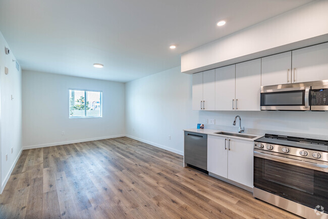 1BR, 1BA - 670SF - Living Room/Kitchen - Adrian Builders at Eureka-18305 &amp; 18355