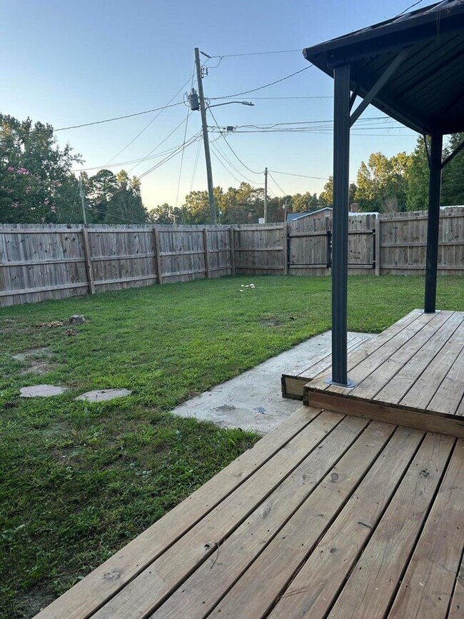 Building Photo - Move-In Ready Corner-Lot Home with Wraparound Porch Near Fort Eisenhower