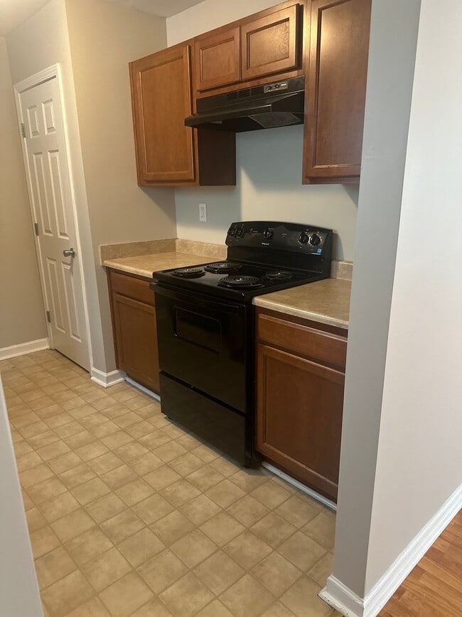Building Photo - Welcome to this spacious 4-bedroom, 2.5-ba...
