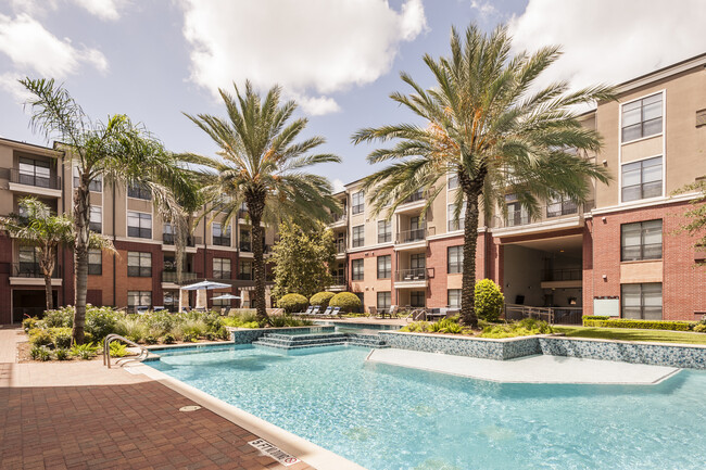 Resort-Inspired Pool with Sun Ledge, Lap Pool, and Waterfall. - The Atlantic Memorial