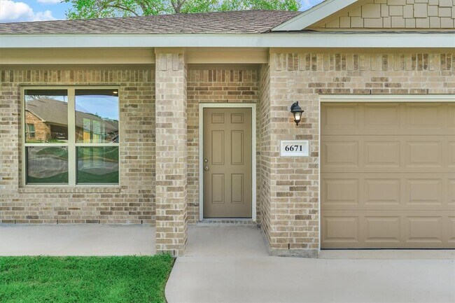Foto del edificio - 6671 Kingston Cove Ln
