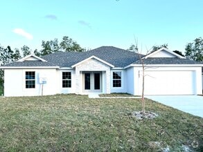 Building Photo - 5797 NW Coosa Dr
