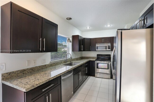 Building Photo - 7722 Hibiscus Ln