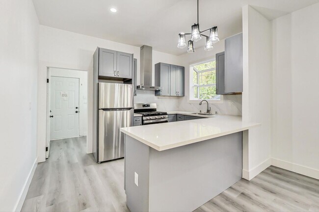 Building Photo - Modern Tranquility: Your Bright Oasis Awai...
