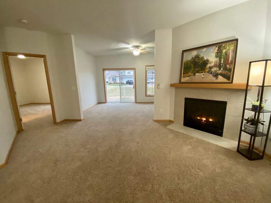 Gas fireplace. Sunroom in back. - 17606 Glasgow Way