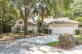 Foto principal - 1425 Whispering Woods Way