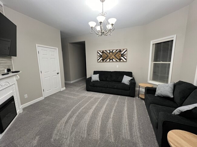 Unit 101 Living Room - 320 W 4th St