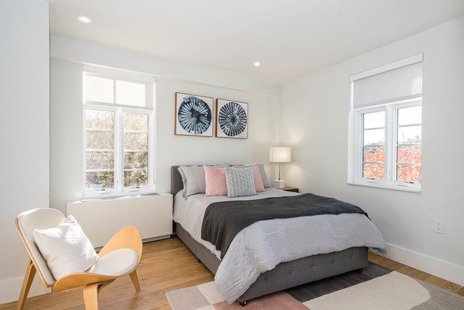 bedroom with hardwood floors and great natural light - 2900 Adams Mill