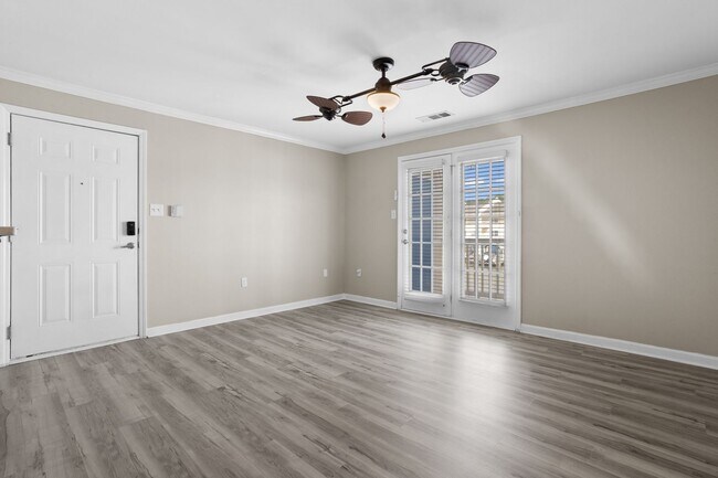 Building Photo - Welcome to Harbor Landing Condominiums — where coastal living meets convenience!